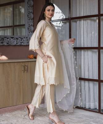 women’s champagne gold chanderi suit set with elegant embroidery 2