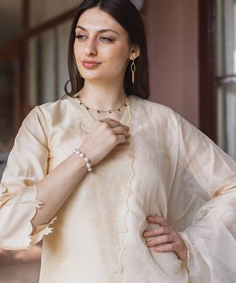 women’s champagne gold chanderi suit set with elegant embroidery 3
