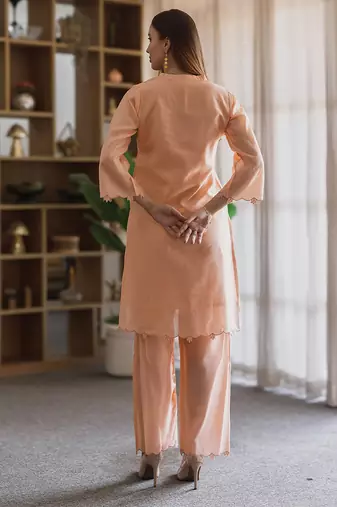 women’s peach chanderi suit set with elegant embroidery
