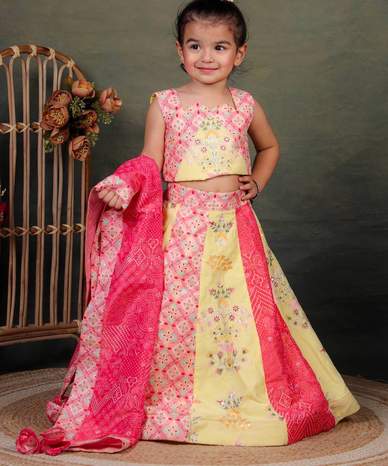 yellow embroidered cotton kids lehenga with pink dupatta