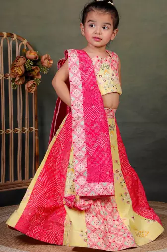yellow embroidered cotton kids lehenga with pink dupatta