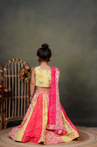 yellow embroidered cotton kids lehenga with pink dupatta