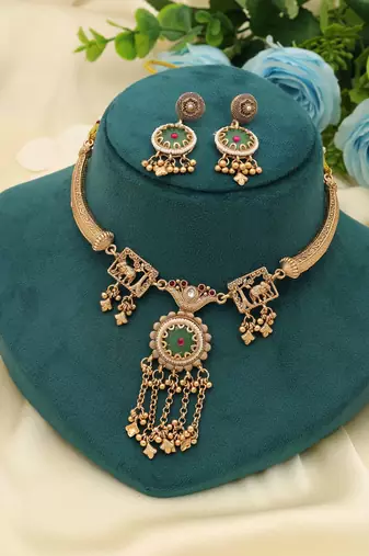 rani and green stone kundan matte gold alloy necklace set