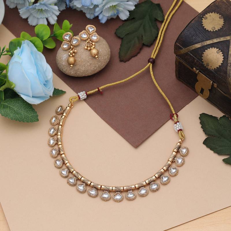 White color matte gold necklace set