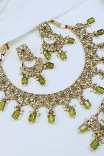 beautiful green antique gold plated ad/zircon work polki necklace jewelry set with maangtika