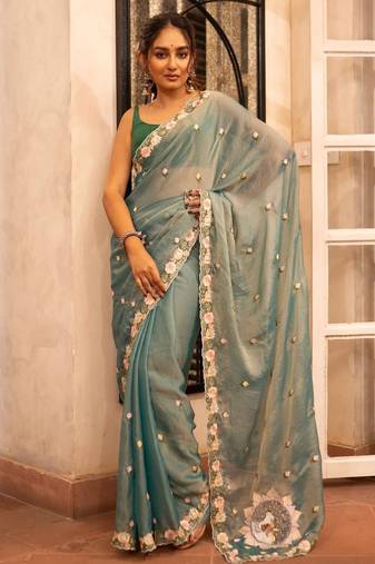 teal silk floral embroidered saree with cutwork border