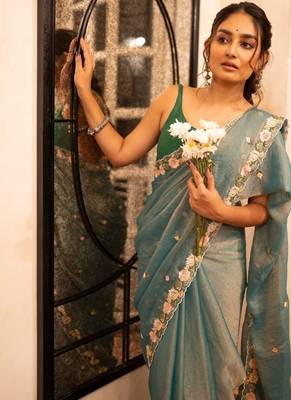 teal silk floral embroidered saree with cutwork border 2