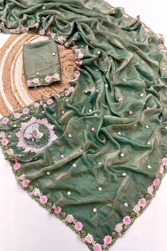 teal silk floral embroidered saree with cutwork border