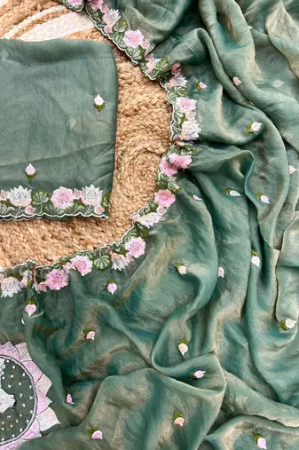 teal silk floral embroidered saree with cutwork border