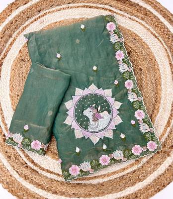 teal silk floral embroidered saree with cutwork border 5