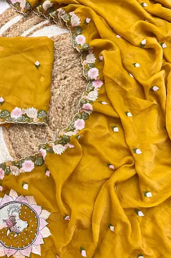 mustard silk floral embroidered saree with cutwork border