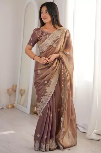 Women elegant woven design saree with embroidered lace border