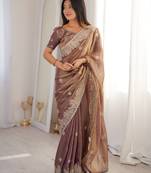 Women elegant woven design saree with embroidered lace border