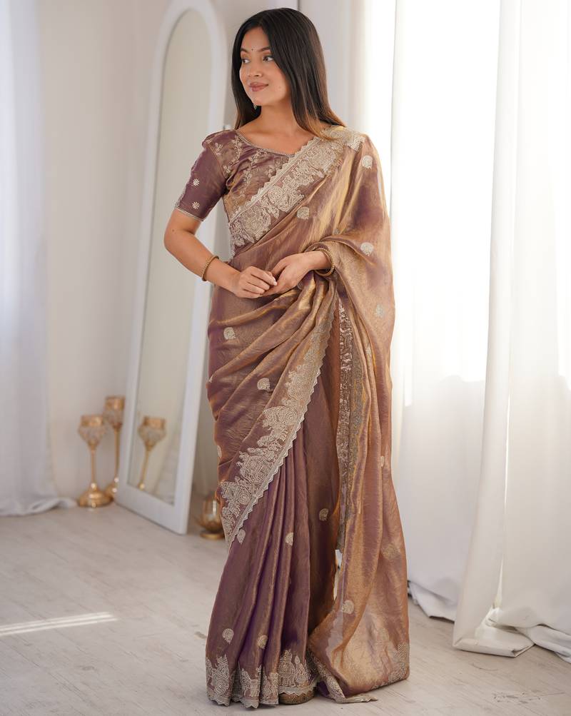 Women elegant woven design saree with embroidered lace border