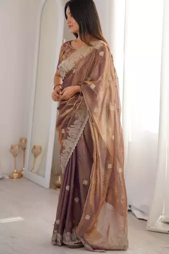 Women elegant woven design saree with embroidered lace border