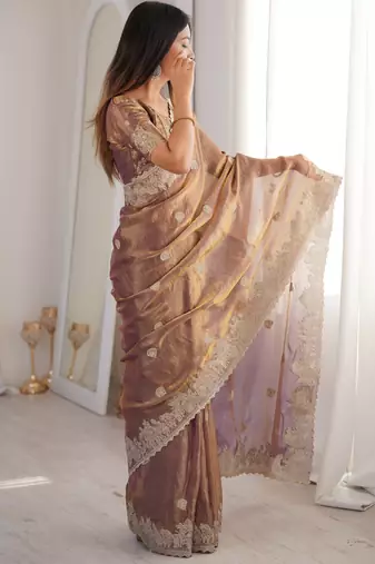 Women elegant woven design saree with embroidered lace border