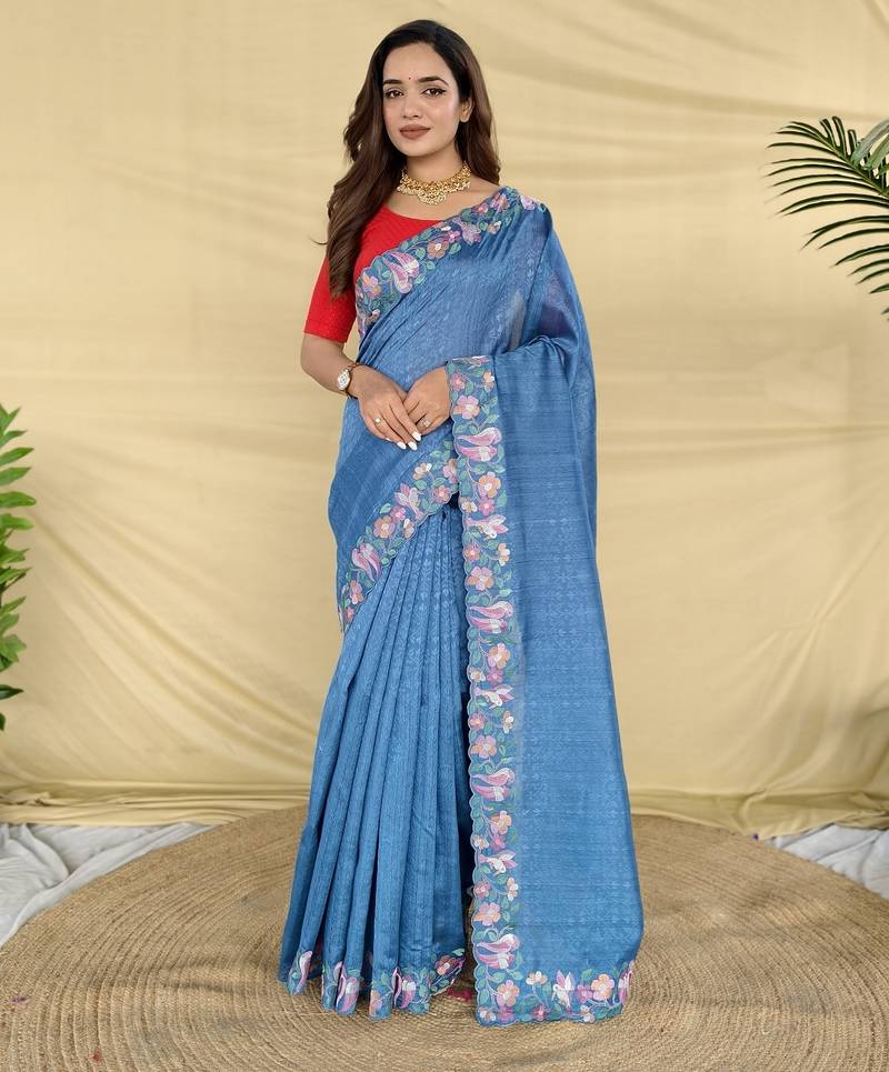 Teal tussar saree with contrast embroidery with running blouse