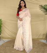 cream floral embroidered tussar silk saree