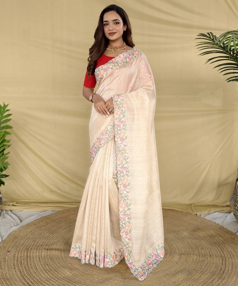 Cream tussar saree with contrast embroidery with running blouse
