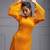 Orange pleated bell sleeve dress
