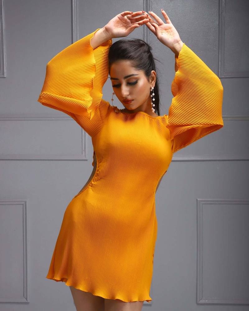 Orange pleated bell sleeve dress