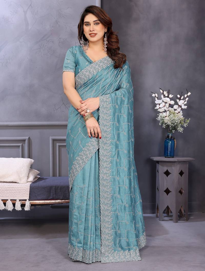 Sky blue vichitra silk saree with sequence embroidery work and matching blouse piece