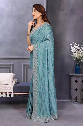 sky blue silk tissue saree with sequin embroidery