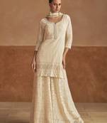 Cream georgette free size stitched suit with embroidery & sequence work