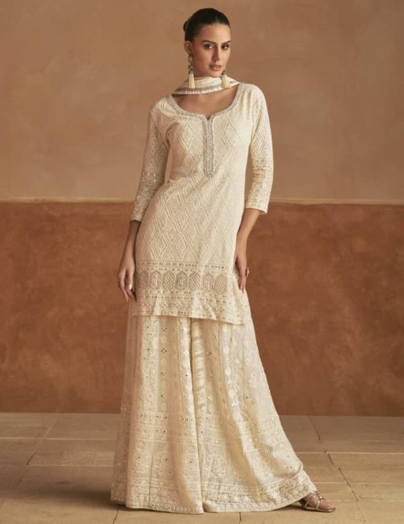 Cream georgette free size stitched suit with embroidery & sequence work