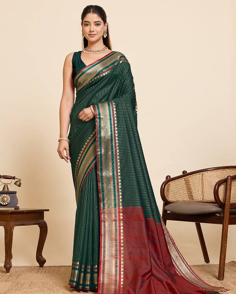 Women's dark green zari striped two tone pallu silk blend saree with rich border and unstiched blouse piece
