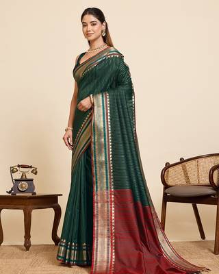 dark green silk blend saree with zari stripes and contrast pallu 2