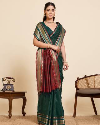 dark green silk blend saree with zari stripes and contrast pallu 4