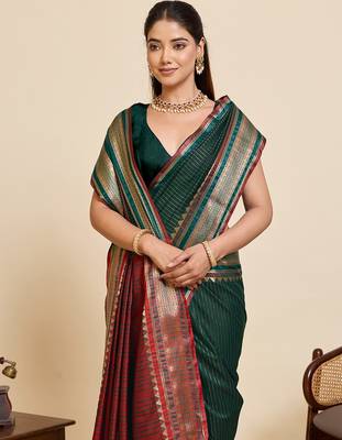 dark green silk blend saree with zari stripes and contrast pallu 5