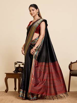 black silk blend saree with zari stripes and contrast pallu 4