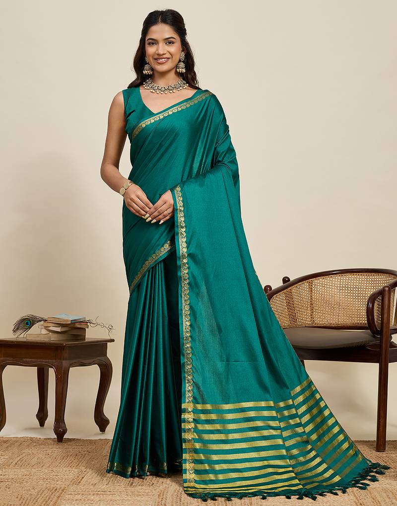 graceful green  silk blend saree with gold zari border and striped pallu with unstiched blouse piece