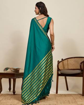 green silk blend saree with gold zari border and striped pallu 3