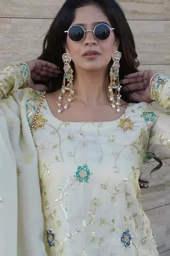 cream chinon sharara set with embroidered short kurti and dupatta