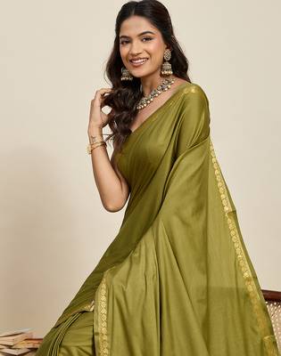 olive green silk blend saree with gold zari border and striped pallu 5