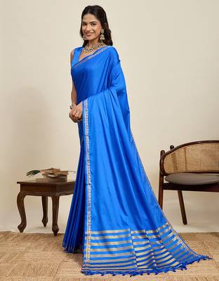 blue silk blend saree with gold zari border and striped pallu
 2