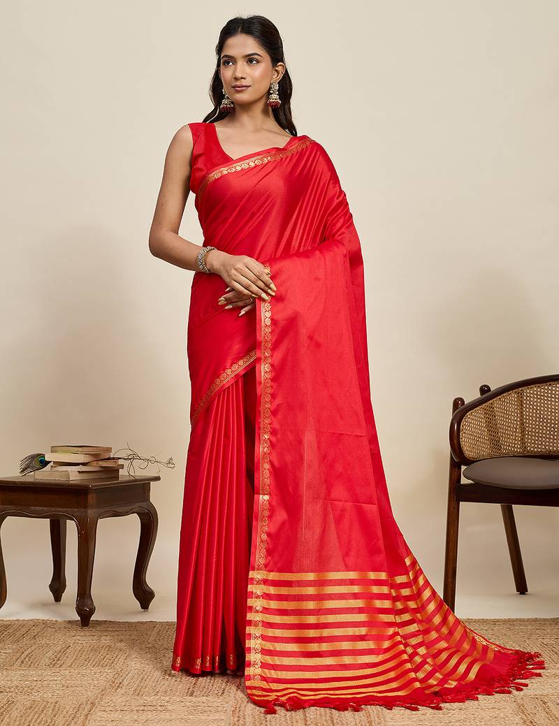 graceful red silk blend saree with gold zari border and striped pallu with unstiched blouse piece