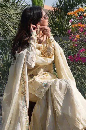 cream chinon sharara set with embroidered short kurti and dupatta