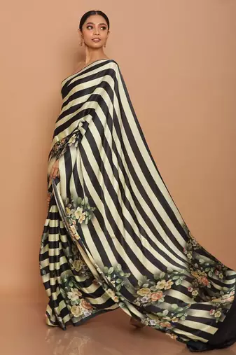 designer satin saree with black stripes and floral design