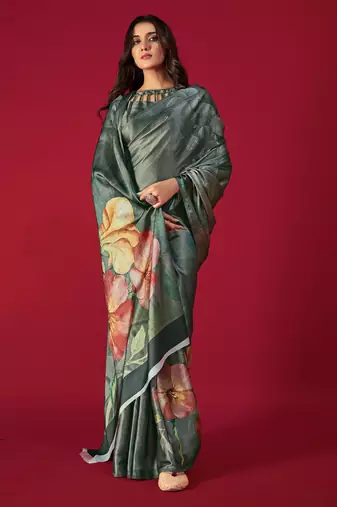 dark green printed satin saree with floral design