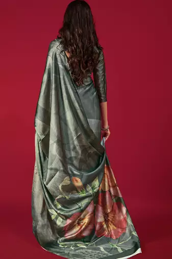 dark green printed satin saree with floral design