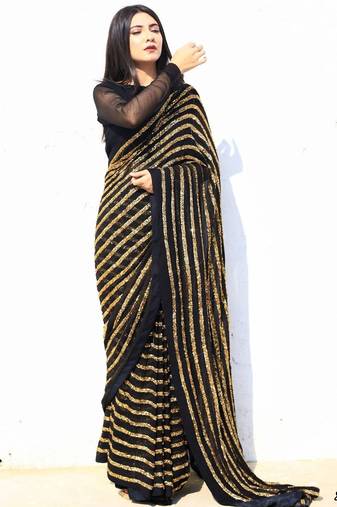 golden colour heavy sequence work all over work with fitting satin lace border