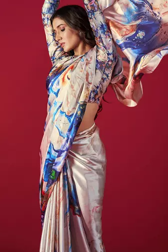 designer satin saree in cream base with multicolor print