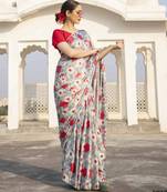 light blue floral printed satin saree with red blouse piece