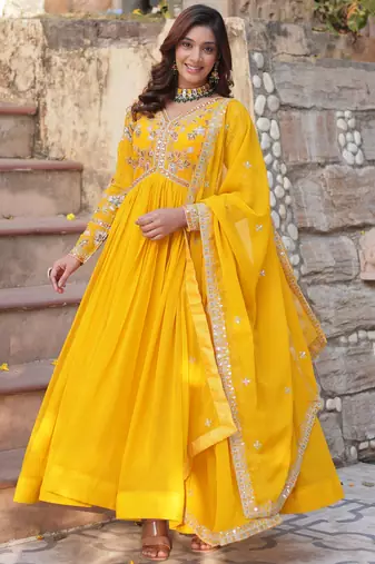 Artistic Yellow Thread Work Georgette Haldi Wear Gown With Dupatta