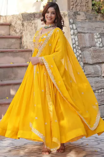 Artistic Yellow Thread Work Georgette Haldi Wear Gown With Dupatta