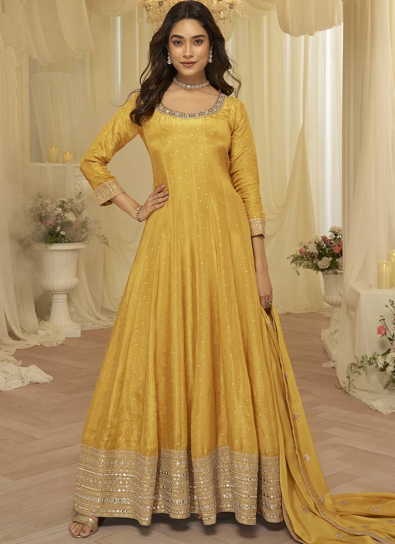 Light-yellow embroidered viscos jacquard silk anarkali suit